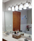 Armada 36 Inch Five Light Modern Vanity Light With Brushed Nickel Finish And Frosted Glass Shades Over Bathroom Mirror