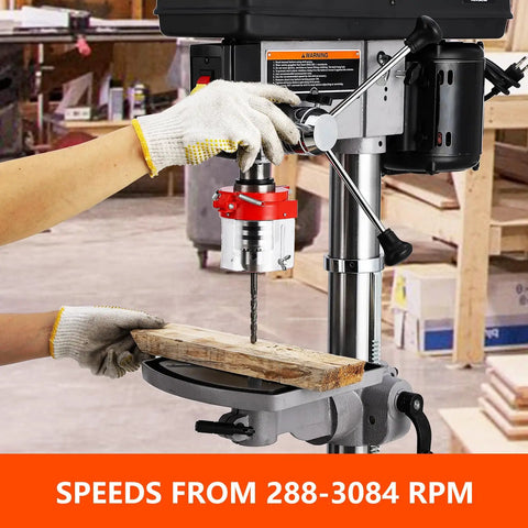 Heavy Duty 13 Inch Floor Drill Press With Variable Speed Control Dead Serious Cast Iron Base 7.5 Amp Motor in use on wood.