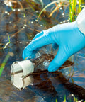 Hand using 3 Piece Glass Erlenmeyer Flask Set 50ml 150ml 250ml with Stoppers and Cleaning Brush Borosilicate 3.3 in outdoor sampling