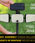 Bionic Motion Sensing Solar Powered LED Black Flood Light, close-up of three adjustable panels and solar panel outdoors