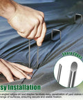 Person installing 12 Inch Galvanized Landscape Staples Stakes For Weed Barrier Fabric And Garden Projects, Rust Resistant Heavy Duty Pins