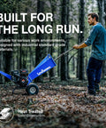 Person using Beast 7HP Gas Powered Wood Chipper Shredder Mulcher For Yards Heavy Duty 3 Inch Max Capacity in forest