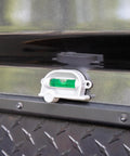 Retro RV Leveling Pack with side to side on point precision mounted with screws on metal surface, vintage camper design visible.