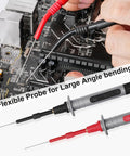 Close-up of 28 Piece Multimeter Test Leads Kit with Replaceable Gold Plated Probes in use on a circuit board.
