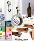 Various colorful ceramic drawer knobs and pulls showcasing multiple styles, used on cabinets, bottles, and hooks.