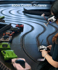 Person using remote to control mini RC cars on track with Ultra Compact Four Channel Gyro RC Receiver for Mini Cars