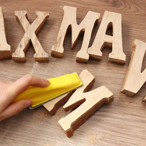 Hand sanding wooden letters with 110 Piece Sandpaper Variety Pack Wet Dry Grit 80 To 3000 For Wood Furniture Crafts and Metal Projects