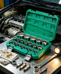 Get That Gritty 12 Point Power Drill Socket Set With Storage Case To Smash Rusty Bolts On Classic Cars And Bikes In Your Garage Without Stressing Out A Bit. 12 point chrome socket set in green case on engine bay workbench