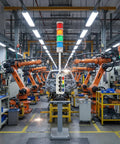 Slick Four Stack Led Andon Tower Light For Busy Factory Floors And Production Lines With Bright Status Alerts, seen in an assembly line.