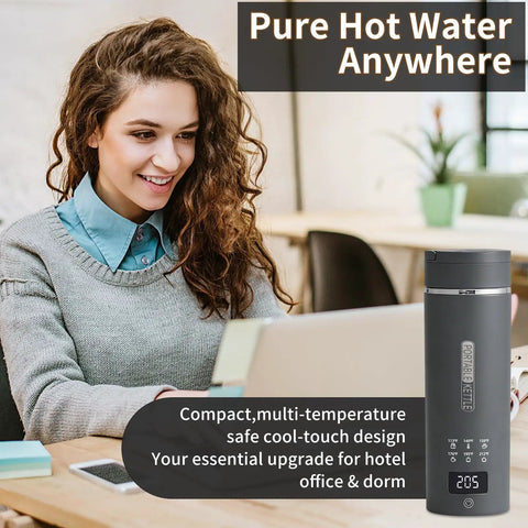 Travel Electric Kettle With 6 Temperature Presets, LCD Display, 304 Stainless Steel, 450ml Capacity, Auto Shutoff And Boil Dry Protection, Ultra Compact Portable Kettle For Home Or Travel Gray next to a woman using a laptop in a cozy setting.