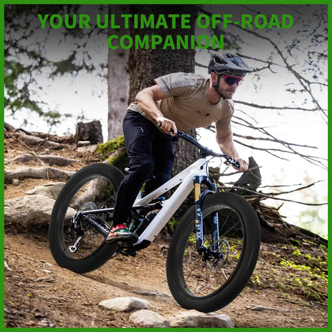 Cyclist on rugged trail using Beefy Fat Tire Upgrade Kit 26x4.0 4 In 1 Replacement Set With Puncture Resistant E Bike Tires
