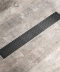 Rock Solid Linear Rectangle Shower Drain in Thick Stainless Steel With Easy Swing Removable Grate Catcher For Bathroom Tile Or Basement Floor Patch in Dope Rose Gold Tone For Zero Sweat Water Routing Daily on wooden floor.