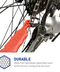 Red quick fix bike tool attached to chain and gear, made from lightweight glass-filled nylon, showing Get Your Chain Back On Your Bike In Three Seconds Without The Mess Quick Fix For Bike Maintenance On The Go Attaches To Your Bike Ready For MTB And Commuter Use Great Gift For Dads Christmas Stocking Filler