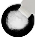 DIY PCB Etchant Dry Powder 8 Oz in space saver bottle pouring odorless fine crystals onto surface for circuit boards