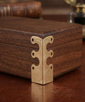 20 Piece Antique Bronze Corner Protectors For Tables And Photo Frames on wooden box corner, detailed design visible