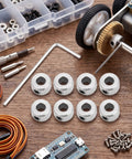 Dead Nuts Secure Set Screw Shaft Collars 5.1mm Bore M3 Locking Ring 10 Pack With Hex Wrench on workbench with tools and electronics.