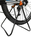 Adjustable Folding Bike Stand For 20 To 29 Inch Bikes Floor Mounted Alloy Steel Rack That Keeps Your Ride Scratch Free holding rear wheel