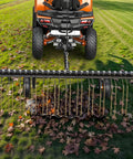 60 Inch Tow Behind Dethatcher For Lawn And ATV, Heavy Duty Lawn Rake With 24 Spring Steel Tines, Lift Handle removing debris