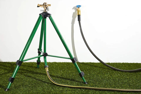 Beefed Up Brass Impact Sprinkler With Adjustable Metal Tripod on grass, hose connected, 1/2 inch head, height adjustable 22-48 inches