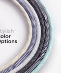 Close-up of braided extension cords in various colors, part of the Three Outlet Surge Protector Power Strip With 10 Ft Braided Extension Cord