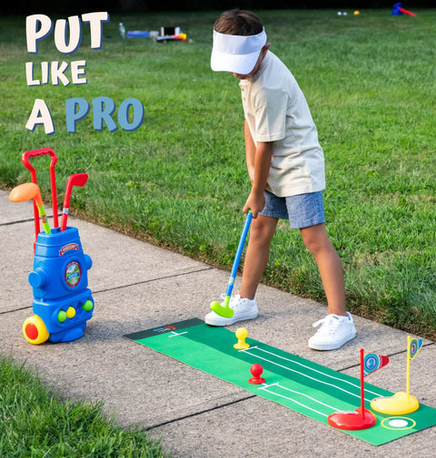 Child playing with Fun Tot Golf Set For Kids with 4 Lightweight Clubs, 6 Soft Balls, 2 Practice Holes, Mini Putting Mat on sidewalk