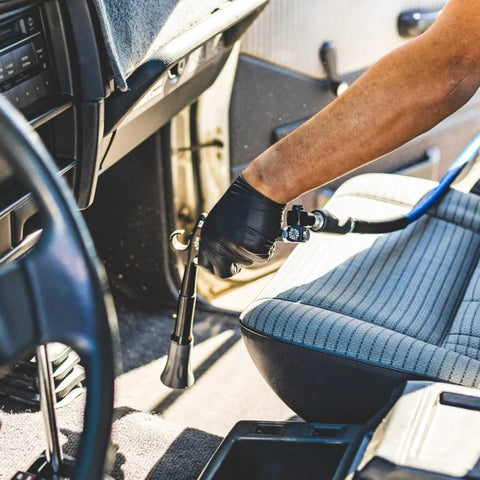 Professional using Ultra Air Hose Swivel Kit With Articulating Swivel For Air Tools And Hoses In Tight Spaces inside vehicle