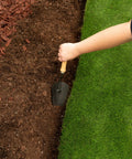 Preparing area for Heavy Duty Composite Landscape Edging With Anchoring Stakes, 4.5 Inch Straight Top Border, 40 Foot Kit, Black