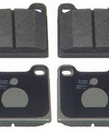1992 Jeep Cherokee Front MX203 Semi-Metallic Disc Brake Pad Set showing four pads with friction material and mounting holes.
